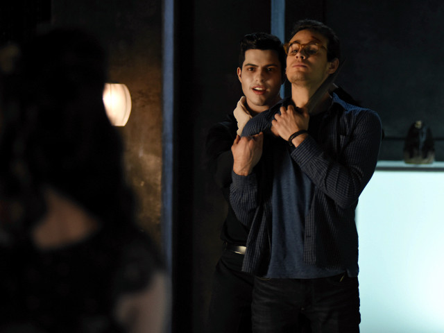 Man adjusting tie mirror woman free wallpaper for desktop - medium preview image