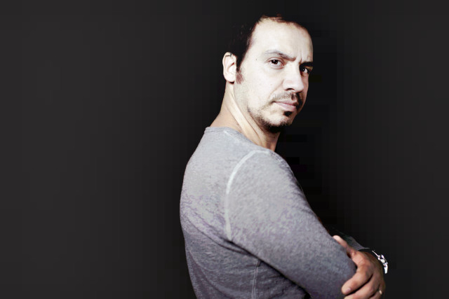 Serious man arm neck dark free wallpaper for desktop - medium preview image