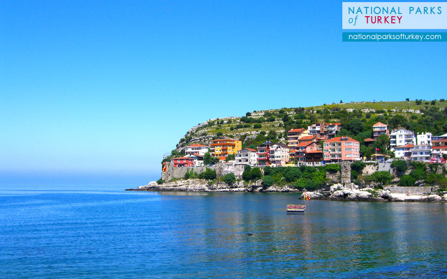 Boat water town hill sign free wallpaper for desktop - medium preview image