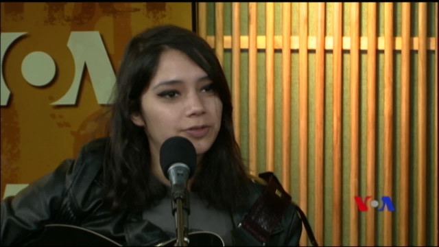 Woman guitar microphone wooden wall free wallpaper for desktop - medium preview image