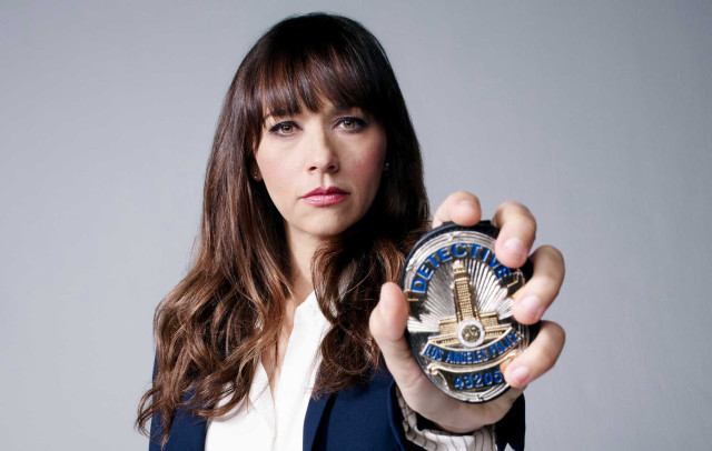 Woman holding clock serious look free wallpaper for desktop - medium preview image