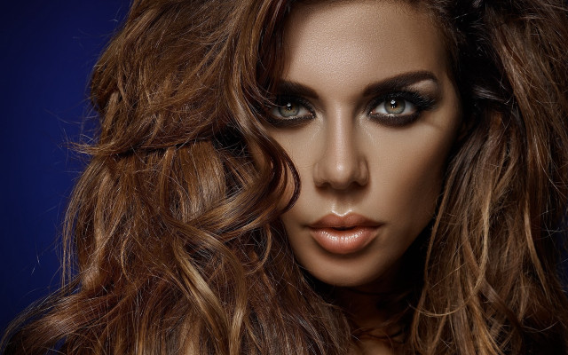 Woman long hair serious look #2 free wallpaper for desktop - medium preview image