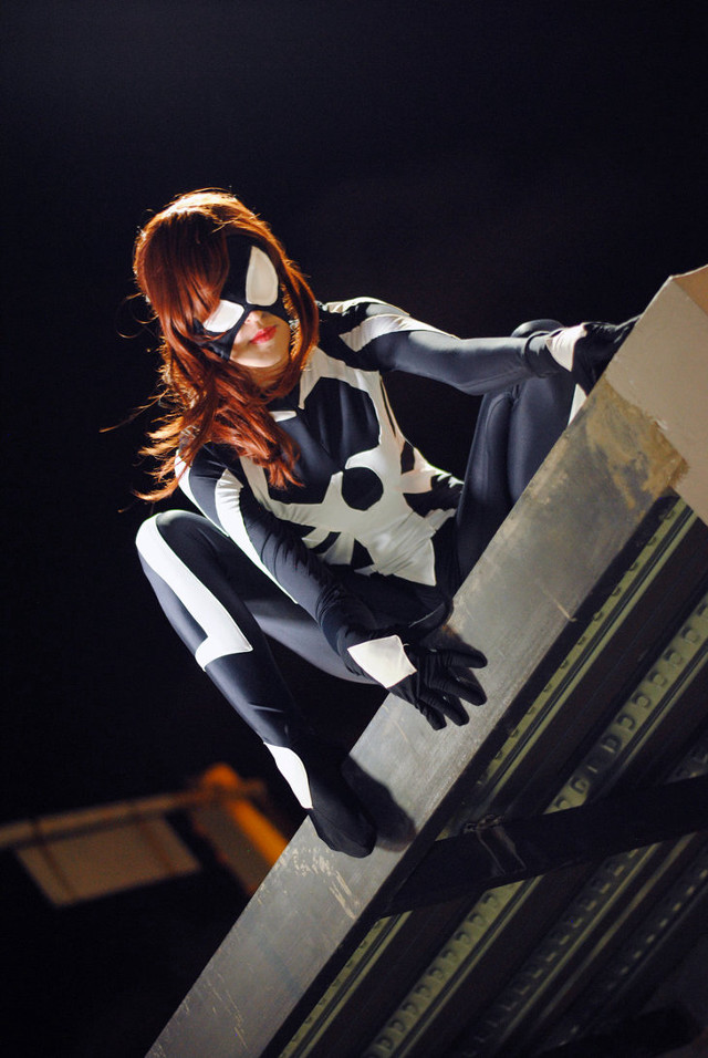 Woman cat suit mask posing free wallpaper for mobile - medium preview image