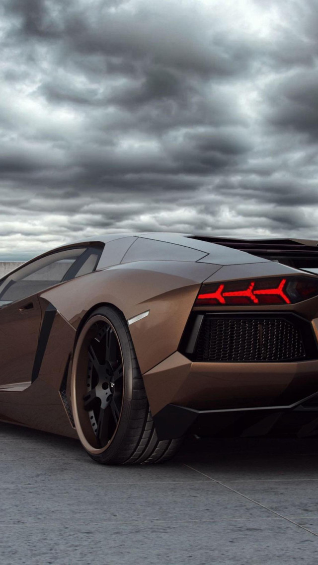 Brown sports car cloudy sky free wallpaper for mobile - medium preview image