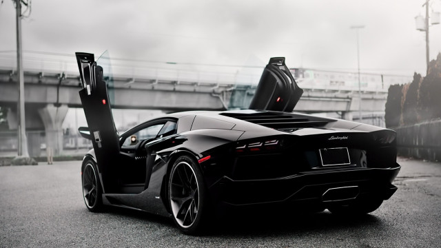 Black sports car parked side free wallpaper for desktop - medium preview image