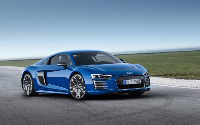 Blue car driving road grass free wallpaper for desktop - medium preview image