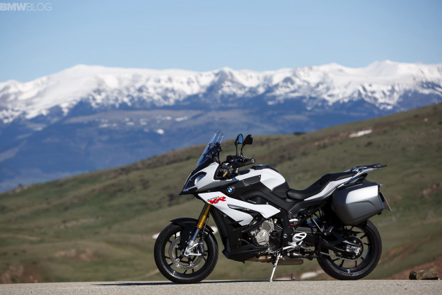 Motorcycle parked road mountains snow free wallpaper for desktop - medium preview image