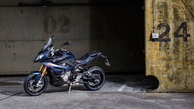 Motorcycle parked parking lot building #2 free wallpaper for desktop - medium preview image