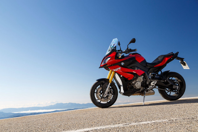 Red motorcycle mountains blue sky free wallpaper for desktop - medium preview image