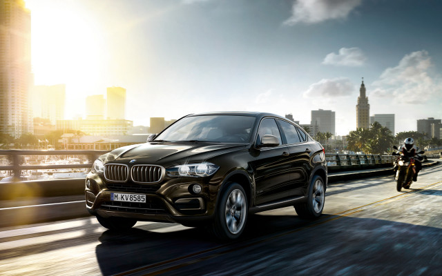 Black bmw suv city street free wallpaper for desktop - medium preview image
