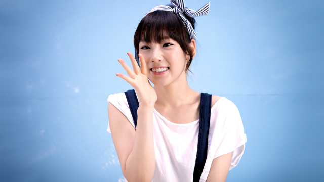 Woman bow hand gesture smile free wallpaper for desktop - medium preview image