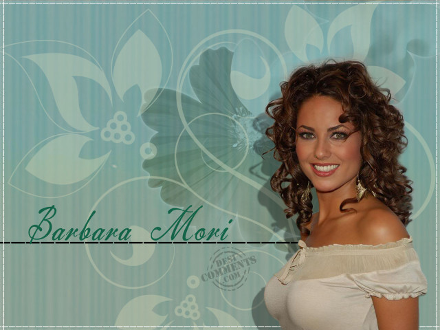 Curly haired woman smiling blue free wallpaper for desktop - medium preview image