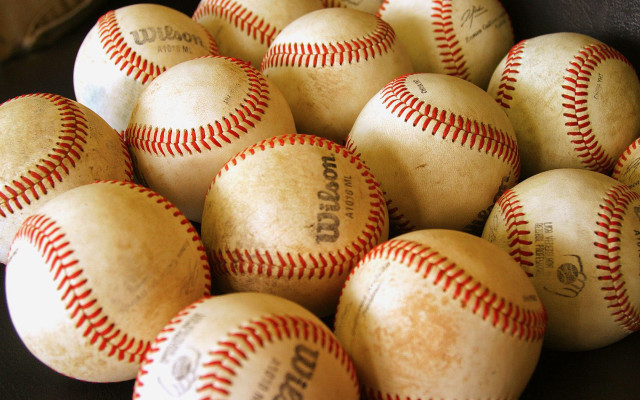 Baseballs pile table glove background free wallpaper for desktop - medium preview image