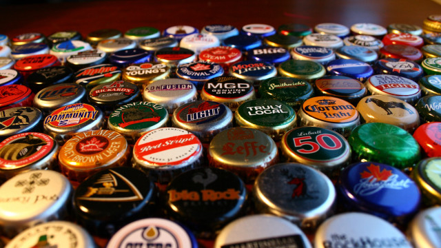 Bottle caps colored magnets table free wallpaper for desktop - medium preview image