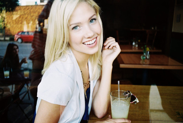 Woman sitting table drink glass free wallpaper for desktop - medium preview image