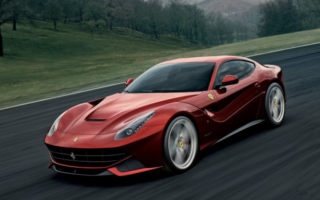Red ferrari sports car driving free wallpaper for desktop - medium preview image