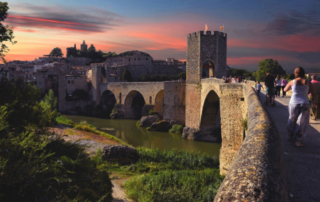 Woman walking bridge river sunset free wallpaper for desktop - medium preview image