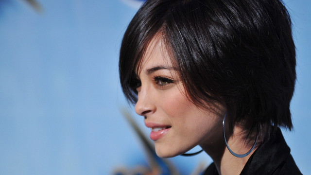 Woman black jacket earrings blue free wallpaper for desktop - medium preview image