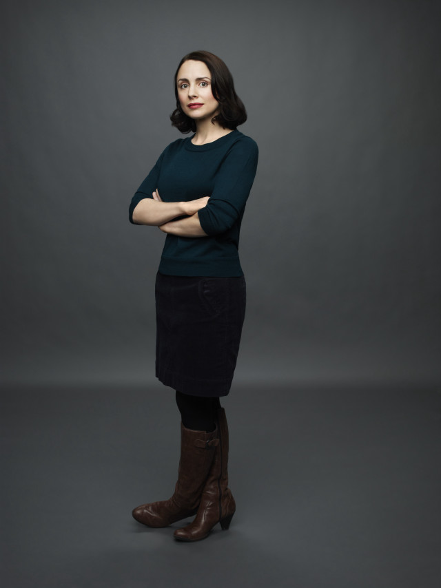 Woman black dress brown boots free wallpaper for mobile - medium preview image