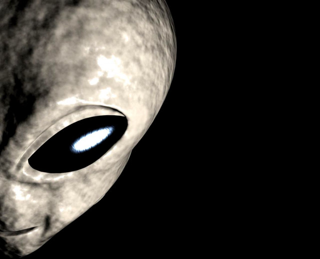 Alien blue eyes black background free wallpaper for desktop - medium preview image