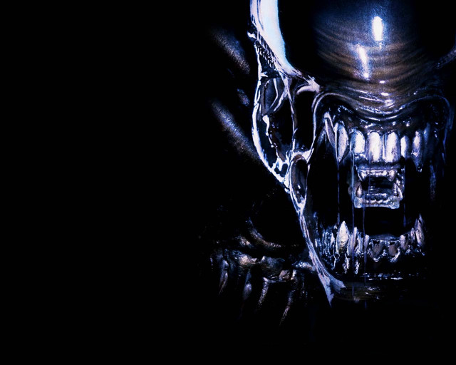 Creepy alien face closeup dark free wallpaper for desktop - medium preview image