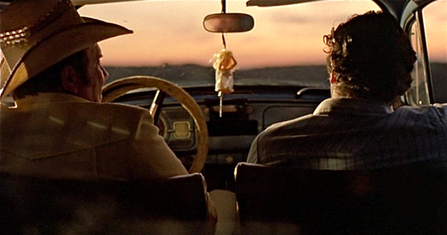 Two men sitting car steering free wallpaper for desktop - medium preview image