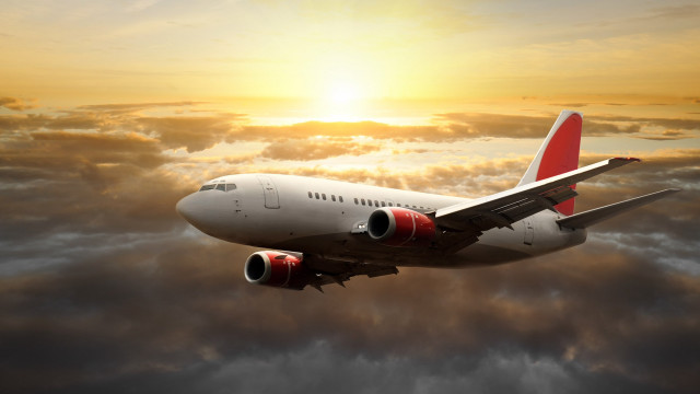 Jetliner cloudy sky sunset sun #2 free wallpaper for desktop - medium preview image