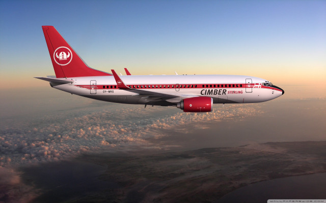 Jetliner flying cloudy sky above #2 free wallpaper for desktop - medium preview image