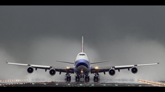 Jetliner takeoff dark clouds landing free wallpaper for desktop - medium preview image