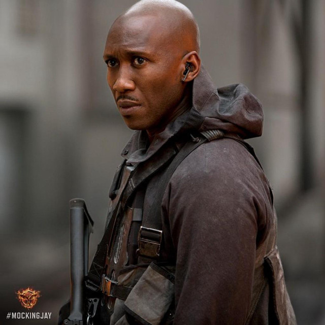 Man gun jacket street afrofuturism free wallpaper for tablet - medium preview image