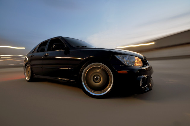 Black car night motion blur free wallpaper for desktop - medium preview image
