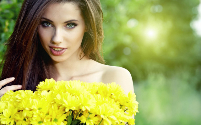 Woman long hair holding flowers free wallpaper for desktop - medium preview image