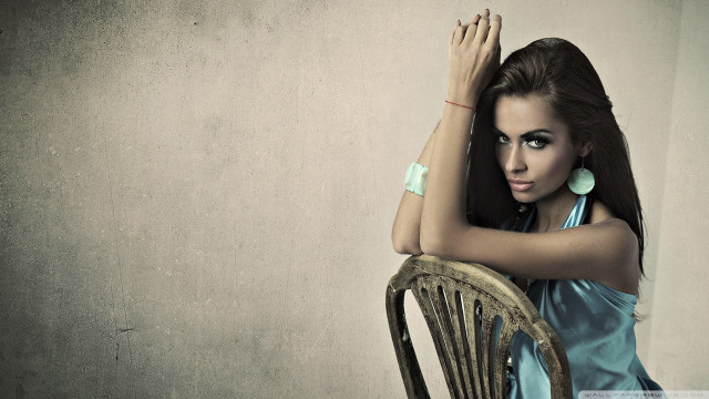 Woman blue dress leaning chair free wallpaper for desktop - medium preview image