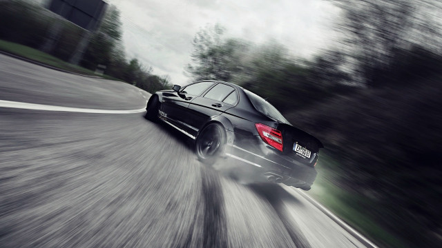 Black car road trees cloudy free wallpaper for desktop - medium preview image