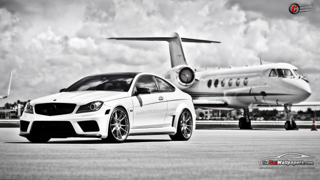 White car parked jet airliner free wallpaper for desktop - medium preview image