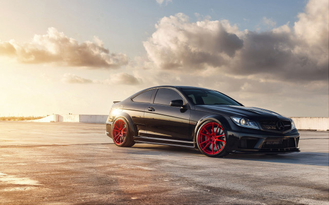 Black car red rims cloudy #2 free wallpaper for desktop - medium preview image