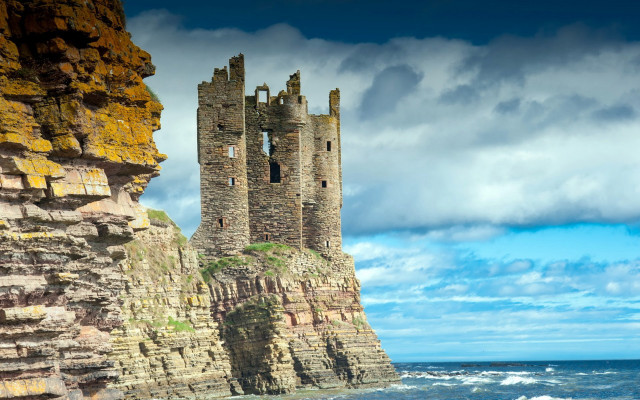 Castle cliff ocean cloudy sky free wallpaper for desktop - medium preview image