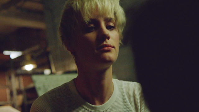 Blonde woman white shirt serious free wallpaper for desktop - medium preview image