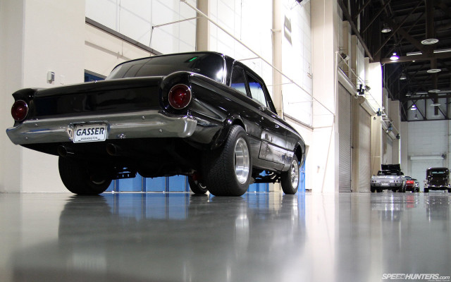 Black car garage building sign free wallpaper for desktop - medium preview image