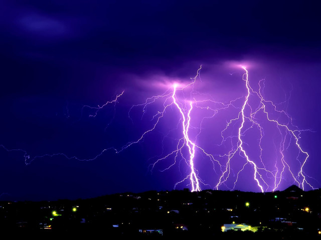 Purple sky lightning city buildings free wallpaper for desktop - medium preview image