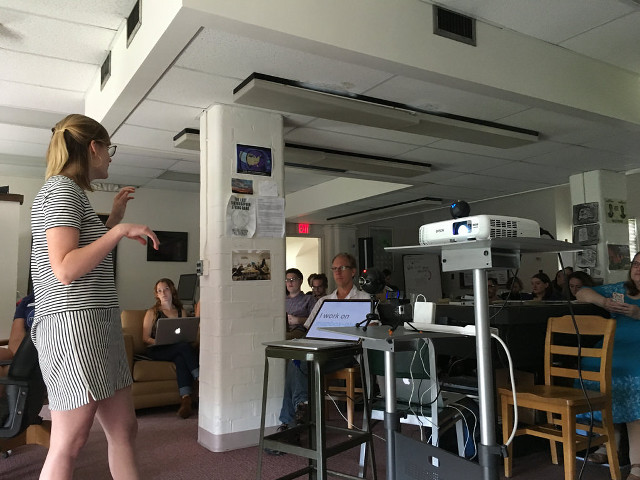 Woman crowd room laptop table free wallpaper for desktop - medium preview image