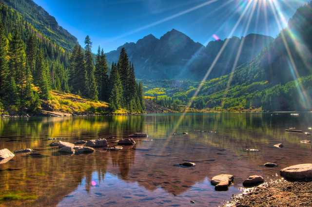 Mountain lake trees rocks sunlight free wallpaper for desktop - medium preview image