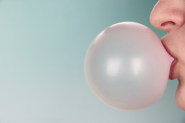 Woman blowing bubble white balloon free wallpaper for desktop - medium preview image