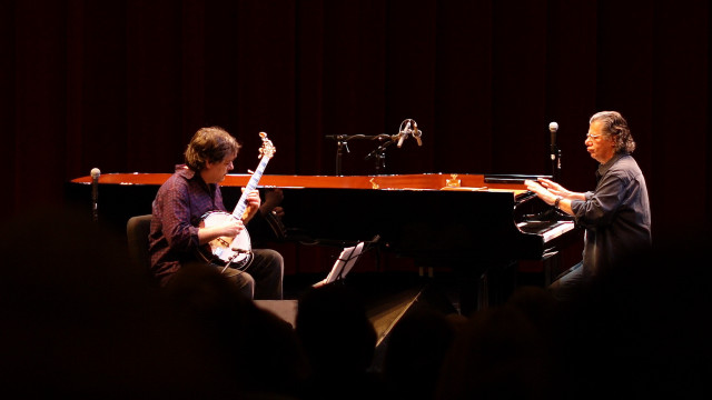 Two people piano microphone stand free wallpaper for desktop - medium preview image