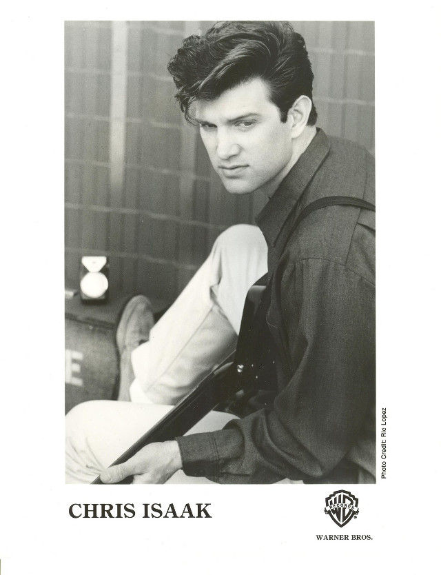 Man holding guitar magazine cover free wallpaper for mobile - medium preview image