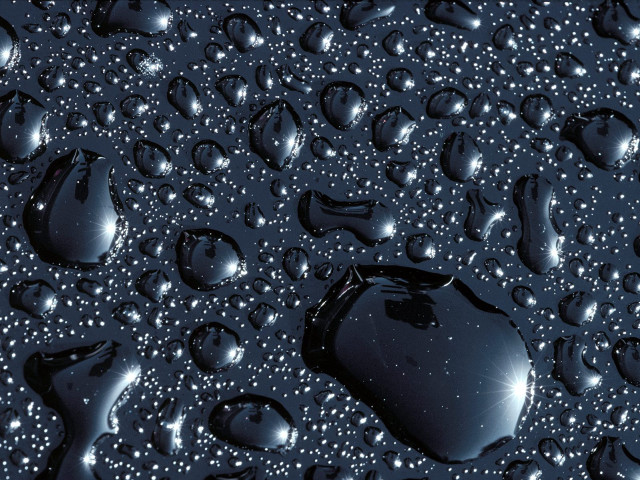 Black apple water droplets macro free wallpaper for desktop - medium preview image