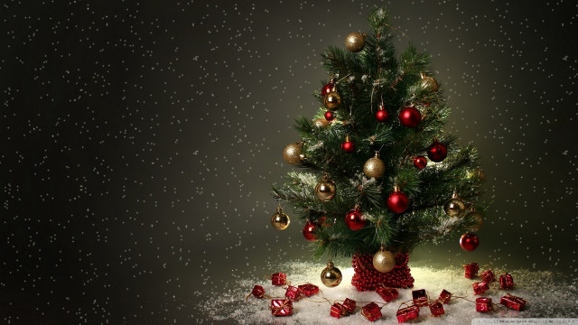 Christmas tree snowing presents night free wallpaper for desktop - medium preview image