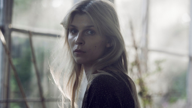 Woman long hair window serious free wallpaper for desktop - medium preview image