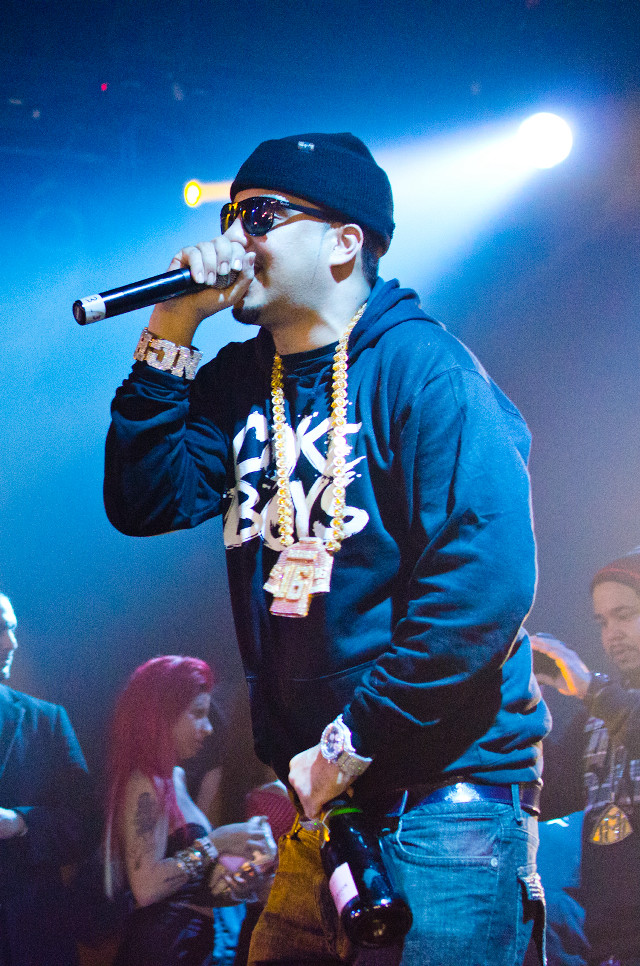 Man black hoodie holding microphone free wallpaper for mobile - medium preview image