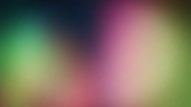Blurry image of a green free wallpaper for desktop - medium preview image